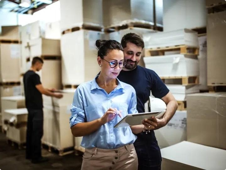 Fiber Internet - Woman checking an order in a warehouse