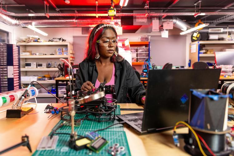 Fiber Internet - Woman working in a repair shop