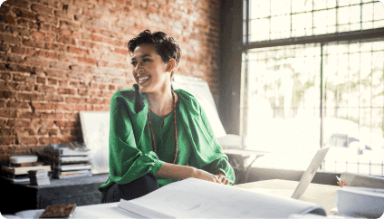 Business Internet - Woman working at desk