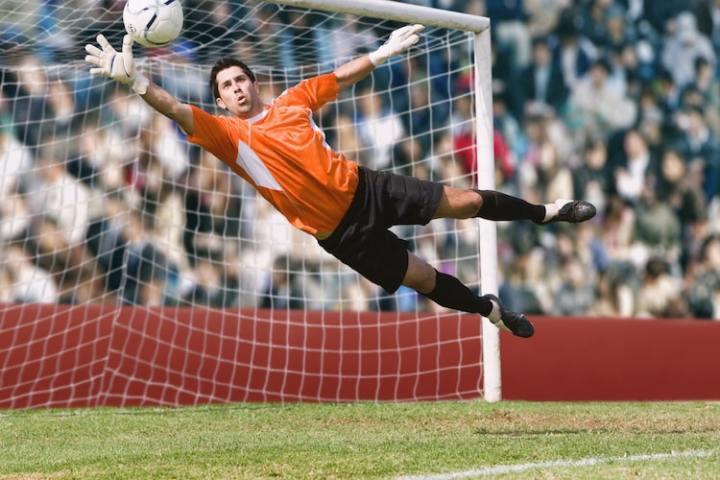 WOW tv+ soccer goalie blocking a shot